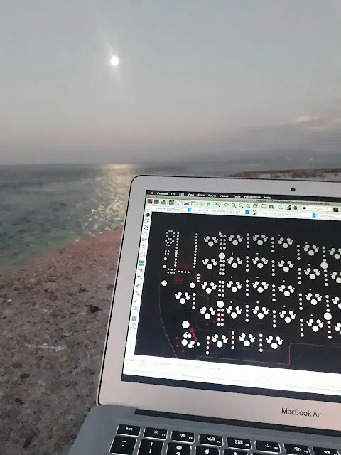 Working on the design at the beach